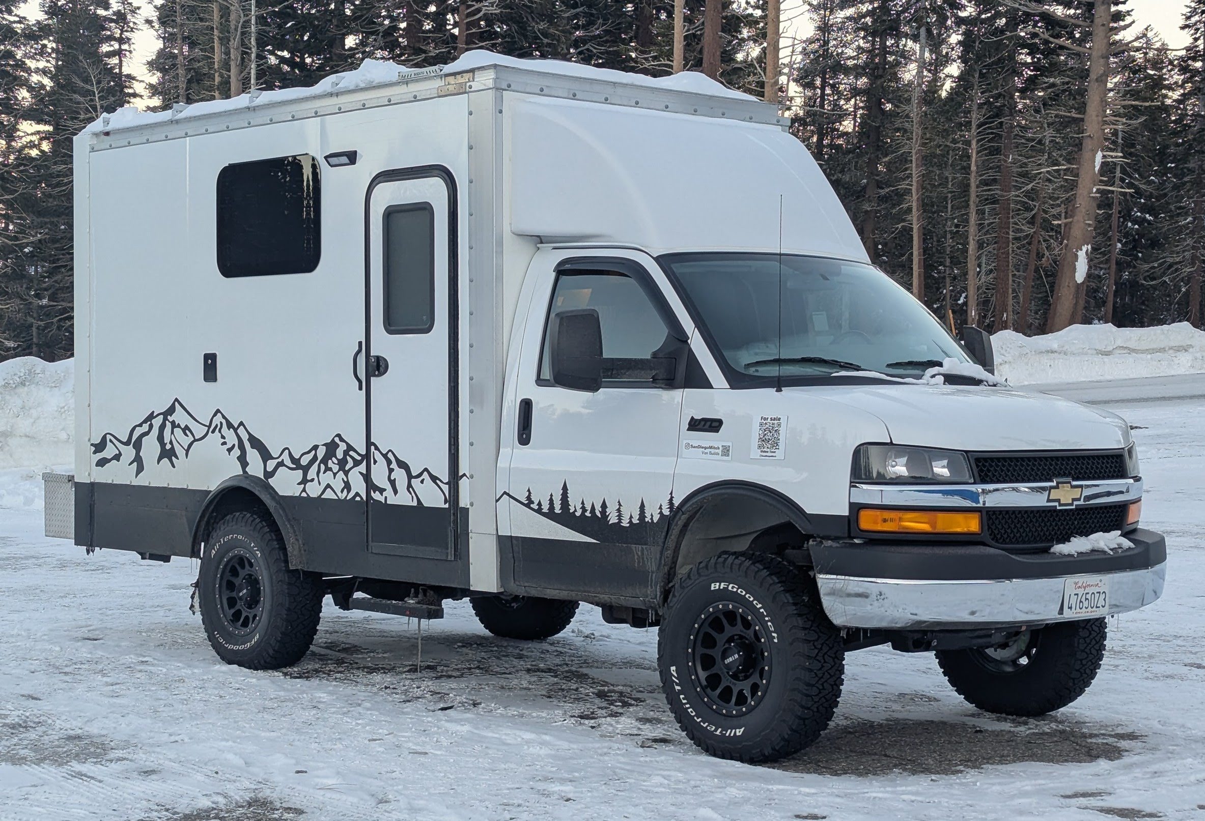 2023 Chevy 3500 custom ski van for sale — exterior daytime in snow